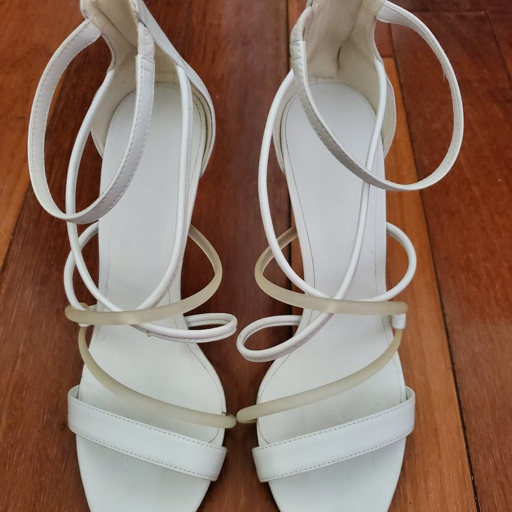 Strappy white heels
